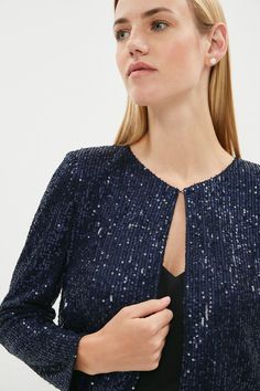 When in doubt, reach for sequins. Adding instant sparkle to formal looks, this gleaming bolero jacket features structured shoulders for a confidence-boosting fit along with long sleeves and a single hook closure. The boxy shape serves to keep the all-over embellishments in focus - perfect for anchoring a clean-lined midi dress or sumptuous satin separates.Style: JacketDesign: Fabric InterestFabric: SequinLength: RegularNeckline: Round NeckSleeve Length: Long Sleeve Bolero Jacket, In Focus, Formal Looks, Embellishments, Open Shoulder Tops, Sequin, Coats Jackets, Jackets & Coats, Midi Dress