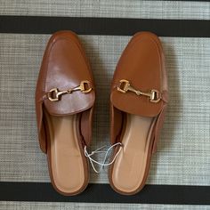 Brand New Old Navy Cognac Brown Faux-Leather Loafer Mule Shoes Size 7 Faux Leather Loafers With Gold Buckle Detail. Brand New. Originally Bought For $35 But I Changed My Mind Outside Of The Return Window. Reasonable Offers Only!! Brown Synthetic Loafers For Work, Brown Slip-ons For Office In Spring, Trendy Brown Mules With Leather Footbed, Business Mules With Round Toe For Fall, Brown Faux Leather Loafers For Spring, Brown Faux Leather Spring Loafers, Spring Brown Faux Leather Loafers, Brown Pointed Toe Synthetic Loafers, Brown Synthetic Pointed Toe Loafers