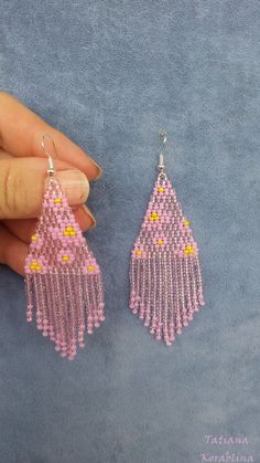 These handmade unique earrings with abstract floral print are made of high-quality Czech beads and strong synthetic thread. I use my author's scheme . They are elegant, fashionable, and highly versatile, suitable for everyday wear. Color: pink,yellow,light pink. 100% hand made with love! I beg you not to copy my authoring Measurements: Length-9 cm (with schwenze) , Width -3 cm Materials: Silver plated ear hooks Czech glass beads Nylon Thread Pink Beaded Chandelier Drop Earrings, Pink Beaded Chandelier Earrings, Bohemian Pink Flower Earrings, Pink Bohemian Flower Earrings For Pierced Ears, Pink Bohemian Flower Drop Earrings, Pink Beaded Flower Earrings As Gift, Pink Dangle Beaded Earrings, Pink Beaded Flower Earrings For Gift, Pink Beaded Drop Flower Earrings