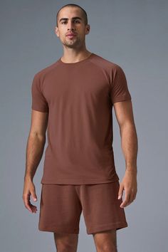 The Triumph Crew Neck Tee - Chestnut | Alo Yoga Sporty Brown Short Sleeve T-shirt, Versatile Moisture-wicking Crew Neck T-shirt, Athleisure Short Sleeve T-shirt For Everyday, Casual Moisture-wicking T-shirt For Loungewear, Versatile Crew Neck Sports T-shirt, Casual Crew Neck T-shirt With Go-dry Technology, Casual Go-dry Crew Neck T-shirt, Casual Solid Color Alo Yoga Activewear, Casual Alo Yoga Activewear With Moisture-wicking