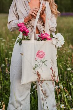 "100% COTTON TOTE BAG \"PEONY\" ✦ Beautiful Floral Tote Bag with a romantic and original print design is for your daily activities, studies and shopping! The print of peony will give your look feeling of lightness, creativity and will allow you to feel closer to nature! Everyday Beige Bag can easily match with your outfits. ✦ The illustration \"Peony\" is a digital artwork created with love and passion. With our illustrations we want to share the feeling of freedom, joy and inspiration! Feel free and express your uniqueness! ✦ MATTERIAL: 100% Cotton ✦ COLOR: Beige ✦ CARE: Handwash only at 30 degrees ✦ FREE SHIPPING WORLDWIDE  United Kingdom: 3-5 business days Germany: 3-5 business days  United States: 5-14 business days Europe: 5-14 business days Australia, New Zealand and Oceania: 15-30 b Pink Shoulder Bag For Everyday Use, Pink Shoulder Bag For Everyday Use On Mother's Day, Pink Tote Bag For Mother's Day, Feminine Floral Print Everyday Bags, Cream Bags As Spring Gifts, Spring Cream Bag As Gift, Cream Bags For Spring Gift, Mother's Day Gift Shoulder Bag, Spring Tote Shoulder Bag As Gift