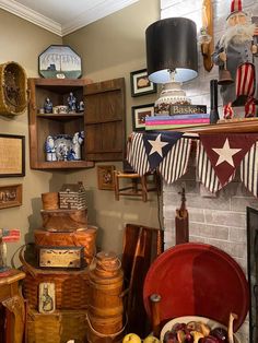 a room filled with lots of old fashioned furniture and decor on top of wooden shelves