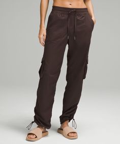 A pocket-forward favourite. This new version of our Dance Studio Pant has a roomier fit with added cargo and back pockets for hands-free storage. Designed for Casual. This new relaxed-fit version of our Dance Studio Pant feels roomier throughout the hips and thighs. Consider sizing down for a less relaxed fit:Full length intended to sit at ankle. Hand pockets with hidden card sleeve. Back pockets. Cargo pockets. Drawcord to customize fit. Cinchable hems let you adjust the look. Lululemon Full-length Bottoms With Elastic Waistband, Lululemon Relaxed Fit Full Length Pants, Casual Full-length Lululemon Pants, Casual Full Length Lululemon Pants, Lululemon Casual Full-length Pants, Lululemon Relaxed Fit Full Length Bottoms, Casual Lululemon Yoga Bottoms, Sporty Lululemon Pants With Side Pockets, Lululemon Casual Yoga Bottoms