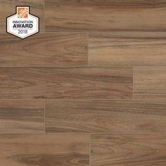 wood flooring with the award badge on it and an orange sticker in the middle