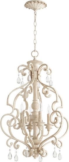 a white chandelier hanging from the ceiling