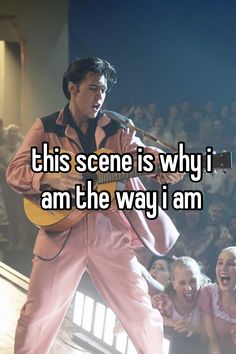 a man holding a guitar and singing into a microphone with the caption, this scene is why i am the way i am