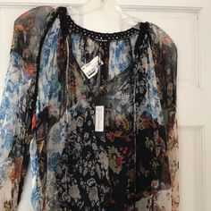 Flowy Floral Bohemian Blouse Spring Boho Print Tunic Blouse, Elegant Multicolor Beach Blouse, Chic Floral Print Blouse For Festival, Flowy Silk Blouse For Spring, Bohemian Spring Tunic Blouse, Bohemian Tunic Blouse For Spring, Silk Long Sleeve Blouse For Festival, Elegant Long Sleeve Festival Blouse, Elegant Long Sleeve Blouse For Festival