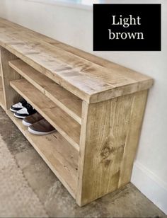 a wooden shelf with shoes on it and the words light brown above it in black