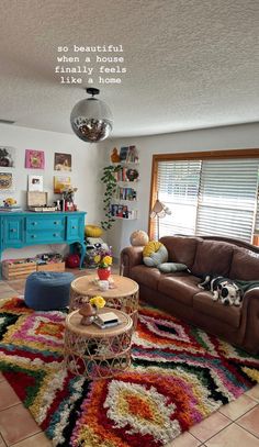 a living room filled with furniture and rugs