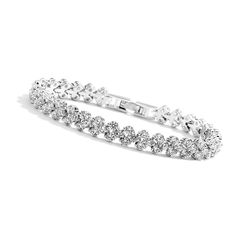 PRICES MAY VARY. 18K white gold plated cubic zirconia classic bracelet, lead free, nickel free and hypoallergenic. 7" lovely stunning crystal silver bracelet for smaller wrist. Cute silver bracelets for women, brides, bridesmaid, wedding, proms or daily wear. Simple CZ tennis bracelet, that you can wear it alone or stack it with other jewelry. Jewelry gift to your friends, your mom, daughter, or wife. Clor: Silver
 Chain Length : 7 inches
 18K White Gold Plated, Hypoallergenic.
 Perfect for ever Shiny Bracelets, Silver Tennis Bracelet, Silver Bracelets For Women, Classic Bracelets, Bracelet Crystal, Simple Bracelets, Bridesmaid Wedding, Crystal Wedding, Mom Daughter