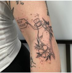 a person with a tattoo on their arm