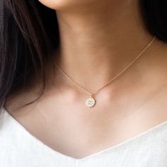 Our dainty zodiac coin necklace features a round scalloped pendant with a zodiac sign on it. …………………………………. Details: Pendant is Gold or Silver Plated over Brass measuring 12mm Chain is 14k Gold/Silver Plated, Gold Filled or Sterling Silver Average necklace length is 18" About Your Jewelry If you are not wearing your jewelry it is best to store it in a cool, dry place such as your gift box that is included in your ord Yellow Gold Zodiac Coin Necklace, Yellow Gold Zodiac Sign Coin Necklace, 14k Gold Zodiac Sign Necklace With Round Pendant, Dainty Tarnish Resistant Medallion Pendant Necklace, Dainty Tarnish-resistant Pendant Medallion Necklace, Silver Gold Plated Zodiac Sign Necklaces, Dainty Medallion Necklace Tarnish Resistant, Sterling Silver Round Coin Necklace, Yellow Gold Zodiac Sign Charm Necklace With Round Pendant