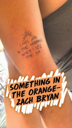 someone has written something on their arm that says something in the orange - zaghbran