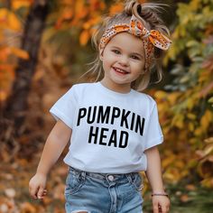 Mama's Pumpkin , Pumpkin Patch Shirt , Pumpkin Head , Pumpkin Shirt , Toddler Shirt , Baby Shirt , Fall Shirts , Fall Toddler Shirts G A R M E N T ∙ F E A T U R E S : * Uniquely soft fabric * Modern, unisex fit * Crew neck and short sleeves - Has a great comfortable fit you are sure to love F I T ∙ & ∙ S I Z I N G * Please consult size chart in pics for accurate fit. Please keep in mind that there are always slight variations in sizing. - Remember unisex tee's fit on the bigger side. F A B R I C Cute Name Print Tops For Fall, Cute Tops With Name Print For Fall, Unisex Cute Cotton Shirt, Cute Cotton Tops With Name Print, White Tops With Funny Text For Fall, Unisex Cute Short Sleeve Shirt, Cute Unisex Tops With Funny Text, Cute Unisex Shirt With Text Print, Unisex Cute Tops With Funny Text