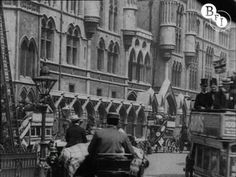 an old black and white photo of people riding on the back of a double decker bus