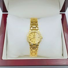 Women's Concord Sarento 24mm Solid 18K Yellow Gold Band Watch, with Roman Numeral Gold Dial, and Diamond Bezel. Includes Mahogany Box. Brand: Concord. Case Back: Solid. Gender: Women's. Condition: Pre-Owned. Dial Color: Yellow Gold. Case Dimensions: 24mm. Bracelet / Strap: Solid Gold. Bracelet Size: 5.3/4 (inches). Bezel Color: 18K Yellow Gold. Condition: Excellent Condition. Movement: Quartz (Movement). Metal Type: 18K Gold Solid Gold. Warranty: 1 Year Limited Warranty. Formal Yellow Gold Diamond Watch With Chronometer, Yellow Gold Diamond Watch For Formal Occasions, Gold Diamond Watch With Chronometer For Formal Occasions, Luxury Gold Diamond Watch (hallmarked), Luxury Gold Diamond Watch Hallmarked, Luxury Gold Hallmarked Diamond Watch, Formal Yellow Gold Diamond Watch Hallmarked, Gold Diamond Hallmarked Watch Gift, Gold Diamond Chronometer Watch