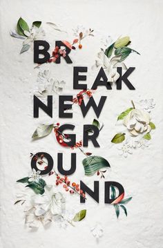 the words break new ground are made up of flowers and leaves in black letters on a white background