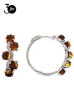 6mm Round Cabochon Tigers Eye Rhodium Over Sterling Silver Hoop Earrings. Measures Approximately 1.17"L x 0.47"W. Hinge with Noted post. Small Hoop Clip-on Jewelry For Anniversary, Brown Round Hoop Earrings For Gift, Hinged White Gold Round Jewelry, Round Clip-on Jewelry For Anniversary, Hinged Round White Gold Jewelry, Small Hoop Clip-on Earrings For Anniversary, White Gold Round Hinged Jewelry, Bronze Hoop Pierced Earrings, Anniversary Clip-on Round Hoop Earrings