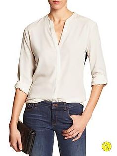 Factory Popover Blouse Versatile V-neck Work Shirt, Versatile V-neck Workwear Shirt, Elegant V-neck Top With Cuffed Sleeves, Elegant V-neck Top With Button Cuffs, Fall V-neck Top With Placket, Chic Long Sleeve Blouse With Roll-up Sleeves, Versatile Workwear Shirt With Shirttail Hem, Elegant Workwear Blouse With Placket, Elegant Workwear Blouse