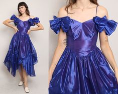 FEATURES - 1980s dress - Indigo blue-ish purple color - Romantic prairie / fairy style - Formal evening wear / prom vibes - Iridescent organza fabric - Off the shoulder silhouette - Spaghetti straps - Ruched sleeves - Fitted waistline - Tea length skirt with an asymmetric hanky hem - Zips up the left side of the waist - Lined body CONDITION Great vintage condition: a few light markings on the dress that are almost impossible to notice because of the fabric sheen and full skirt. MEASUREMENTS & FIT suggested letter size: XS/S (tag is marked a vintage women's US 7) bust (underarm): 32"-33" waist: 26"-27" max hip: 44" length: 48"-54" shoulder to waist: 15"-18.5" color: indigo blue-ish purple material: polyester, acetate, zipper label: Steppin' Out pinned on model? no Note on fit: Adrianne is 5 80s Formal Fashion, 80s Dresses Formal, Violet Prom Dresses, 80s Formal Dress, Prom Vibes, 80s Prom Party, Iridescent Organza, 1980s Prom Dress, 1980s Prom