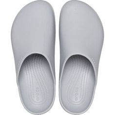 The Dylan Clog melds the classic styling of mules with the unbelievable comfort of Crocs' classic Croslite material. The soft cushioning of the footbed keeps our feet fresh for long walks along the boardwalk or hours of chores around the house and backyard. The easy slip-on style stays next to the door so we can slide them on as we head out of the house, but there's no guarantee we'll want to take them off when we get back home. Non-slip Synthetic Slide Clogs, Comfortable Closed Toe Synthetic Slides, Comfortable Synthetic Closed Toe Slides, Comfortable Non-slip Slide Clogs, Slip-resistant Round Toe Slides In Solid Color, Comfortable Solid Color Slides With Rubber Sole, Classic Non-slip Closed Toe Clogs, Classic Closed Toe Non-slip Clogs, Comfortable Lightweight Slides With Round Toe