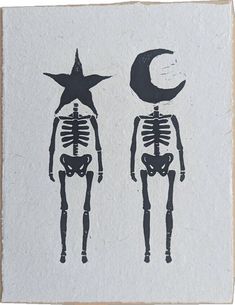 two skeletons are standing next to each other with the moon and star on their heads