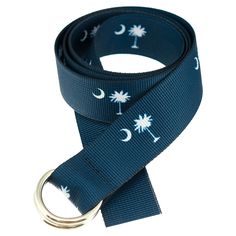 a black lanyard with white palm trees and moon symbols on it, one side has a silver ring at the end