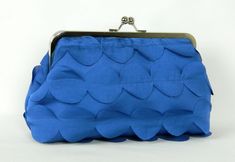 NOTE: ALL OF MY BAGS ARE HANDMADE TO CUSTOMERS INDIVIDUAL ORDERS!! A lovely handmade Royal Blue Frill Design Clutch purse. Fully lined with Navy Blue Satin fabric to compliment outside design, and reinforced with heavy weight interlining and interfacing to maintain stability and structure. CHAIN HANDLE INCLUDED. The size is perfect to carry your essentials for a day or night out, i.e mobile phones, keys, make-up, credit cards and coins. The purse as well as many others in my collection would als Blue Clutch Purse, Wedding Clutch Bag, Blue Satin Fabric, Blue Clutch Bag, Ladies Gifts, Womens Messenger Bag, Bridesmaid Clutches, Fabric Gift Wrap, Clutch Bag Wedding