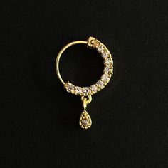 Name of Product: Bridal Traditional Jewelry Indian Antique Nose Ring. It requires a hole in the nose ( piercing is required ) Unfortunately no exchanges /refunds due to hygiene reasons Diameter: 1.3/1.5/1.8/2.4 Centimeter Platting: Gold Material: Copper Piercing: Left Side To view our latest collection of Nose rings / Nath please click the below link. https://www.etsy.com/uk/shop/HemrajJewellers?ref=seller-platform-mcnav§ion_id=30100702 Jewelry care instructions : 1. Please wipe the jewelry with Latest Gold Nath Designs For Bride, Indian Nose Ring Hoop, Gold Nose Jewelry, Gold Nath, Bridal Nath, Nose Ring Designs, Nose Ring Indian, Nose Ring Gold, Nath Nose Ring