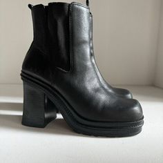 Introducing these vintage black leather booties with a stylish square toe and a super chunky block heel. These ankle boots are perfect for any fashion-forward woman who wants to make a statement.  The upper and lining material is made of high-quality leather, while the outsole is made of durable rubber. These boots come in US shoe size 10 and are perfect for any occasion.  The shoe shaft style is ankle, making them perfect for pairing with skinny jeans or dresses. With a timeless style and high-quality materials, these booties are sure to become a staple in any wardrobe. Good condition. Some wear as pictured. Made in Brazil Super Chunky, Chunky Block Heels, Leather Booties, Boot Shoes Women, High Quality Leather, Timeless Style, Vintage Black, Block Heels, Timeless Fashion