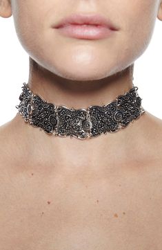 Ornate filigree shapes a dramatic choker necklace for vintage-inspired style. 8" length + 2" extender Adjustable clasp Metal alloy, glass crystal Imported Ornate Metal Choker Necklace, Adjustable Filigree Jewelry For Party, Victorian Metal Choker Jewelry, Filigree Metal Jewelry For Parties, Metal Filigree Jewelry For Parties, Elegant Adjustable Oxidized Choker, Formal Gothic Metal Choker, Ornate Party Choker Jewelry, Ornate Metal Choker Jewelry