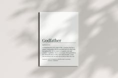 a white book with the words godfather on it