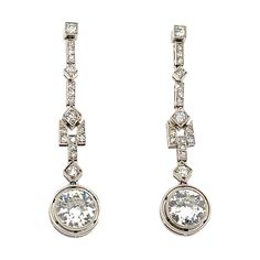 Amazing creation crafted over 100 years ago. This fantastic pair of earrings is crafted in platinum and has truly stood the test of time as they are more beautiful today, than the day they were created. The earrings are set with approximately 4.60 carat of natural old mine cut diamonds. These earrings are elegant and stunning as they scream Art Deco with style and craftsmanship only seen from that time period. The diamonds in this pair are white in color showing E-F color and show Si clarity. Th Scream Art, Platinum Earrings, Creation Crafts, 100 Years Ago, Luz Natural, Art Deco Diamond, Art Deco Jewelry, Earrings Dangle, Earring Backs