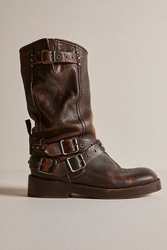 Bring out your inner rebel with these rough-and-tough, buckled-adorned boots from We The Free. **Features:** Mid-calf length, pull-on style, vegetable-tanned leather uppers, round toe, grommet buckle accents at topline and vamp, slight heel, studded details **Why We | We The Free Janey Engineer Boots at Free People in Brown, Size: US 6 Rugged Distressed Brown Moto Boots For Fall, Brown Rugged Moto Boots With Buckle Closure, Rugged Boots With Buckle Closure For Fall, Rugged Fall Boots With Buckle Closure, Distressed Brown Leather Moto Boots For Fall, Fall Distressed Brown Leather Moto Boots, Brown Leather Punk Boots, Western Moto Boots With Rivets For Fall, Edgy Leather Moto Boots With Grommets