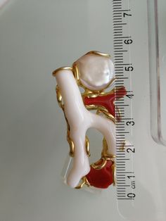 Exclusive and elegant ring with two natural corals of the Mediterranean. White coral sprig, red coral, with natural white baroque pearl. Gold-plated silver frame. Size coral sprig 6 cm.Adjustable ring size. With gift box. Unique White Pearl Ring Gift, Unique White Pearl Ring As Gift, Unique White Pearl Ring For Formal Occasions, Elegant White Red Coral Jewelry, Unique White Pearl Ring For Wedding, Red Coral Ring, Natural Pearl Ring, Purple Quartz, Coral Ring