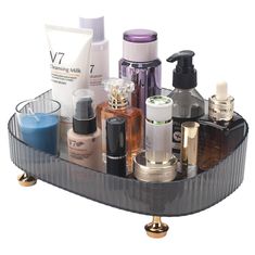 an assortment of cosmetics and skin care products on a tray