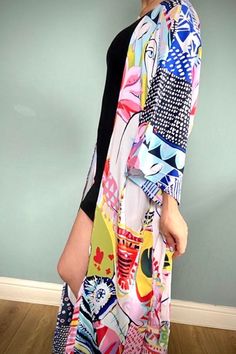 Beautiful handmade vintage / Boho style kimono robe, ideal for fashion at home or wear over jeans & tee. Beach cover up, multi coloured Art print design.Lovely, floaty, soft silky fabric, ideal for covering up on the beach or throw over pyjamas. Pretty multi colour design, features flowers, ladies faces, and modern art styling. Free size fits from UK size 8 to size 16machine washable Long Sleeve Multicolor Dresses For Vacation, Multicolor Long Sleeve Vacation Dresses, Pink Abstract Print Maxi Dress For Summer, Pink Maxi Dress With Abstract Print For Summer, Multicolor Summer Kimono For Beach Cover-up, Multicolor Floral Print Maxi Dress For Festival, Festival Multicolor Floral Print Maxi Dress, Multicolor Printed Maxi Dress For Summer, Multicolor Floral Print Maxi Dress For Holiday