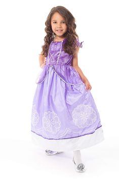 PRICES MAY VARY. This gorgeous new Purple Amulet Princess dress will be a hit with your little girl. The comfortable stretchy purple velvet bodice has intricate white trimmings, organza overlaid sleeves, and a purple amulet at the neckline. The full satin skirt is trimmed with delicate white designs and organza hip drapes. Machine washable! Made for everyday play and adventure. No buttons, zippers, or ties to frustrate little fingers. No itchy underskirts or fabrics. Completely finished seams an Purple Amulet, Sofia Party, Purple Princess, Princess Dress Up, Sparkle Shoes, Tiny Bow, Up Costumes, Princess Dresses, Dress Up Costumes