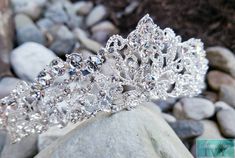 "*Please note this item is final sale and cannot be returned. If you have questions about the returns or our policy, please see the F.A.Q section everything is updated and correct. Thanks in advance* ❤Shop with us online at - https://SomethingIvy.com/❤ Ship Fast - 1.75\" Silver Crystal Crown - Silver High Tiara - Sweet 16 Silver Crown - Quince Crowns - Wedding Crown - Reign Crowns Encrusted with shimmering rhinestones and a marquis base row, this opulent design enhances your ensemble with unforg Wedding Crown With Rhinestones And Pinched Shape, Silver Wedding Crown With Pinched Shape, Silver Wedding Crown With Rhinestones, Silver Rhinestone Wedding Crown, White Wedding Crown With Pinched Shape, White Pinched Crown For Wedding, Quince Tiaras, Winter Quinceanera, Quince Crowns