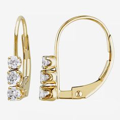 These elegant hoop earrings feature 6 mined white diamonds set in 14K gold. The timeless hoop design and lever back lend a classic touch to any outfit.Features: Quick ShipDiamond Clarity: I2-I3Earring Back: Lever BackSetting: ProngStone Cut: RoundDiamond Color: G-HMetal Color: YellowCenter Stone Weight: 1/4 Ct.Earring Length: 14.4mmEarring Width: 2.5mmRounded Carat Weight: 1/4 Ct. T.w.Care: Wipe CleanStone Type: 6 Natural DiamondAuthenticity: Natural DiamondBirthstone: April BirthstoneEarrings T Three Stone Diamond, Jewellery Gold, Leverback Earrings, Yellow Gold Earring, Diamond Drop Earrings, Diamond Stud, Fine Earrings, Gold Drop Earrings, 14kt Gold