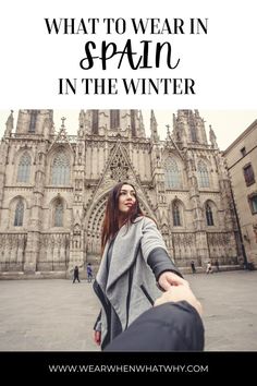 Woman in grey coat holding hand of a person our of shot with Barcelona Cathedral in the background. Spain Cold Outfits, December In Europe Outfits, Winter In Seville, Spain January Outfits, Madrid January Outfit, Madrid In December Outfits, Barcelona December Outfit, What To Pack For Spain In November