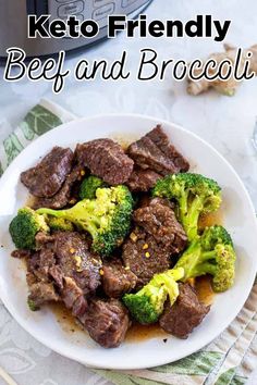 beef and broccoli on a white plate with the text keto friendly beef and broccoli