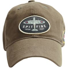 Anglophiles and aviation enthusiasts alike will appreciate this ball cap that pays homage to the Supermarine Spitfire, the fighter that punched above its weight to save the British Isles from tyranny. The khaki-colored hat is made from comfortable brushed cotton twill. A woven patch on the front shows the Spitfire’s iconic silhouette and the Royal Air Force roundel is embroidered on the side. The Union Jack flag and the word “Supermarine” in an attractive script decorate the back. With its adjus Jack Flag, Supermarine Spitfire, Custom Caps, Royal Air Force, Flight Jacket, British Isles, Cool Hats, Union Jack, G Shock