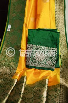 An exquisite Banarasi in spectacular combination of Yellow and green with incredible zari work on the elegant motifs on the body, border, and pallu, handwoven on resplendent pure Katan silk. These rustling silks with tapestry-like motifs in their glistening accents are rooted deep in tradition and dipped in regality. The super smooth and soft fabric makes it an absolute delight to drape and carry for occasions like festivals, pujas, celebrations, parties, weddings, etc. A must-have unique Saree Green Silk Unstitched Suit For Wedding, Pista Green Banarasi Silk Anarkali Set With Zari Work, Green Silk Churidar With Traditional Drape, Unstitched Green Silk Suit With Zari Work, Elegant Green Unstitched Suit With Cutdana, Green Traditional Anarkali Set In Art Silk, Green Silk Unstitched Suit With Cutdana Details, Green Raw Silk Unstitched Suit For Diwali, Unstitched Green Art Silk Suit Bollywood Style