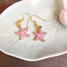 (Nwt) Gold And Pink Star Fish Earrings Fashion Jewelry Pink Star Jewelry With Starfish Charm, Pink Star-shaped Jewelry With Starfish Charm, Pink Starfish Charm Jewelry, Pink Starfish Jewelry For Gift, Handmade Pink Star-shaped Jewelry, Pink Dangle Earrings For Beach, Pink Beach Jewelry With Matching Earrings, Pink Jewelry With Matching Earrings For Beach, Starfish Earrings