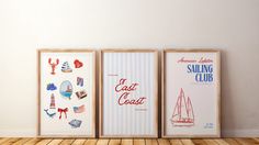 three framed art pieces on a wooden floor in front of a white wall with an american flag and sailing club