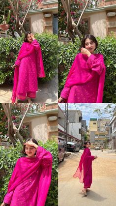 the woman is wearing a pink outfit and posing for pictures in front of some bushes