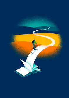 a man riding a bike on top of an open book