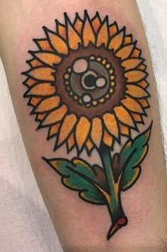 a sunflower with a skull on it's head is shown in this tattoo