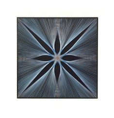 an abstract blue and black pattern with lines in the center, framed on a white wall